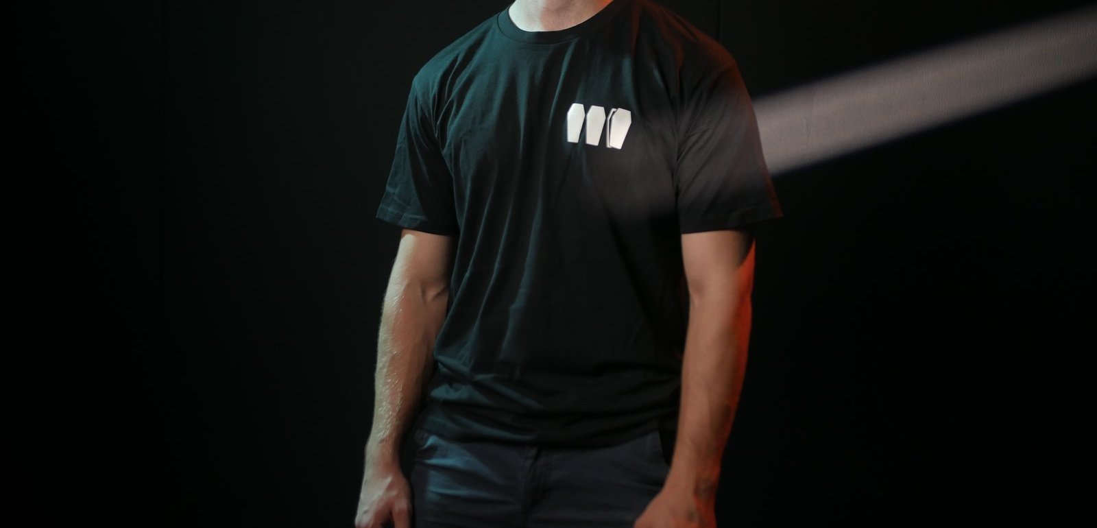 Front of the Skeleton Collective heavyweight black crew t-shirt, three coffin marks printed on the left chest.